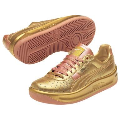 gold athletic shoes for women.